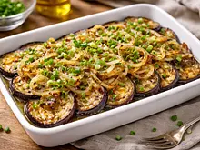 Berenjenas fritas con cebolla